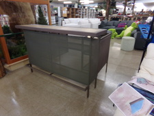 OUTDOOR PATIO BAR
This bar is metal and glass .  The back side opens up with work stations but will fold in for storage.  Has foot rest on front side.  
$221.30