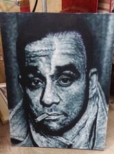 Man on canvas.  Just one of the pictures available in our department.  
$19.10