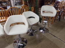 Set of three adjustable barsools
*Italian leather*
$225.00