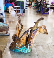 UNUSUAL DRAGON... this is large made of drift wood pieces.  Center is a round platform, like to hold a large planter?  Very unique and at front of store.
$154.80