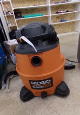 15 GAL. SHOP VAC.  
By Rigid.  has attachments.  Find in tools

$37.50