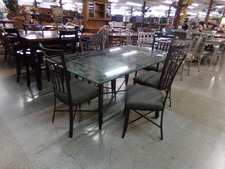 Dark brown metal framed table and chair set
Glass top
6 chairs included
$156.70