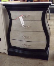 BLACK BOMBAY DRESSER.  Has silver industrial look top and front of drawers.  4 drawers.  Smaller than most 18