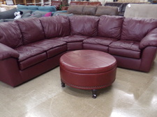 Burgandy sectional.  
Ottoman is sold separately.
$895.00