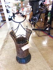 UMBRELLA STAND.  Of course could hold other items, but is very nice.  Possible antique.  Is at front of store
$22.50